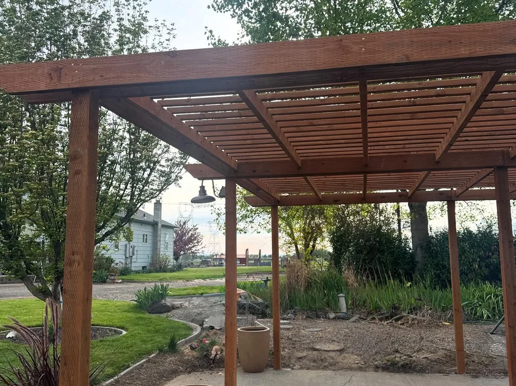 Cedar pergola over a concrete patio, general contracting